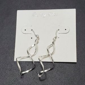 **Sale** Sterling silver swirly twirly dangling earrings
